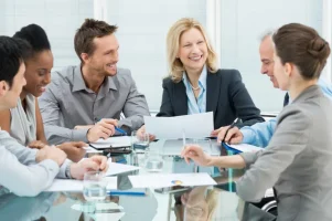 depositphotos_24462049-stock-photo-happy-business-in-meeting